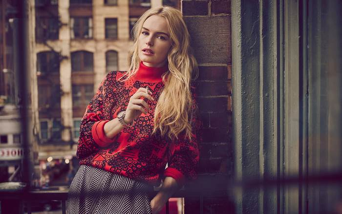 Kate Bosworth in red sweater and patterned skirt