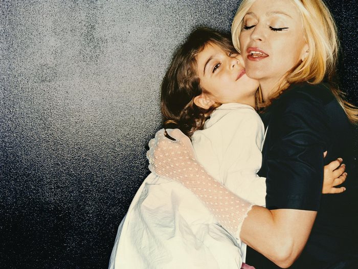 Madonna and child embracing