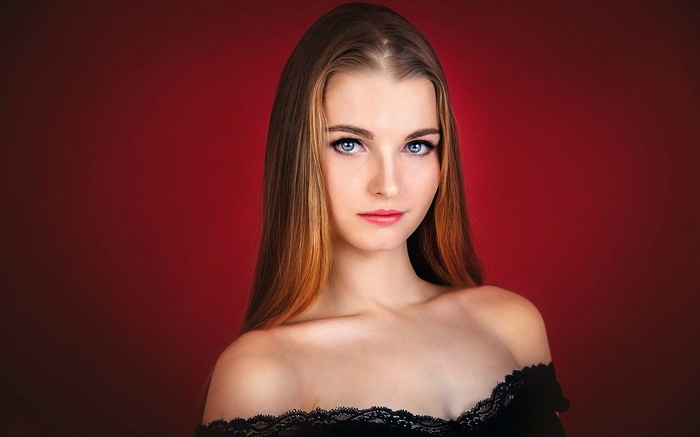 Woman with blue eyes and long brown hair