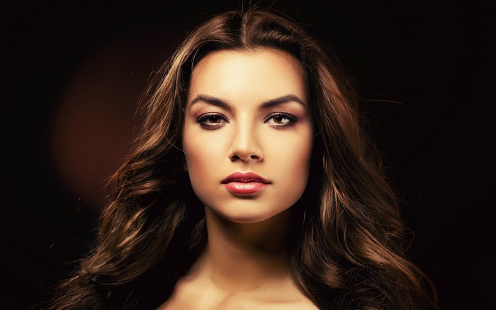 Woman with long wavy brown hair