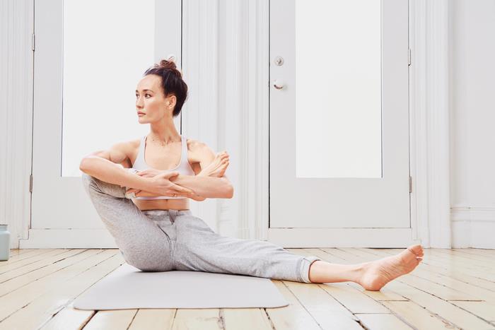 Maggie Q doing yoga