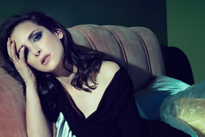 Winona Ryder on a couch