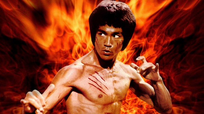Bruce Lee in front of flames