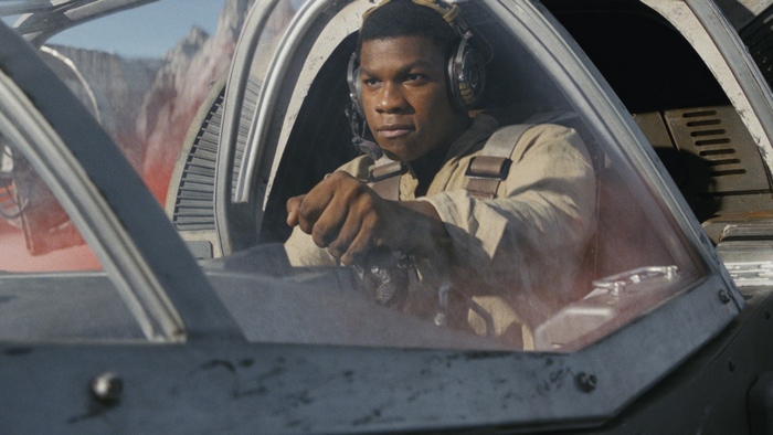 Finn from Star Wars in a cockpit