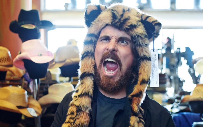 Christian Bale wearing a tiger hat