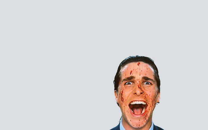 Christian Bale with blood splatters