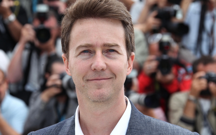 Edward Norton at an event with photographers
