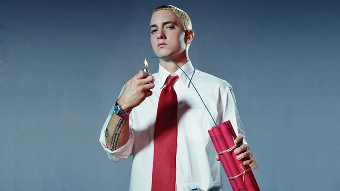 Eminem holding dynamite and lighter