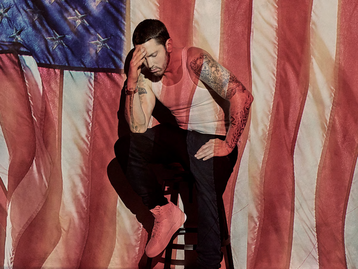 Eminem in front of American flag