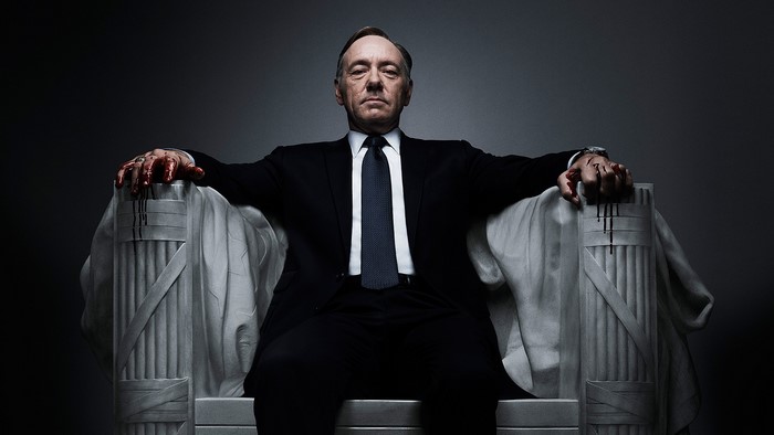 Kevin Spacey sitting on a throne