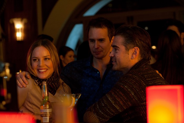 Sam Rockwell and two others at a bar