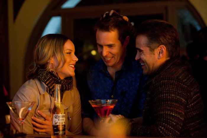 Sam Rockwell and two others at a bar