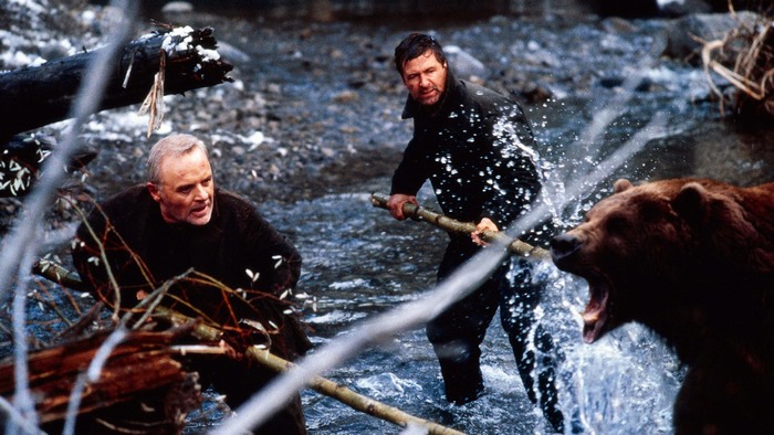 Anthony Hopkins and a bear in a river