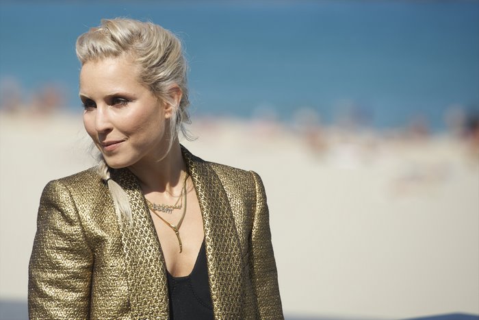Noomi Rapace on a beach