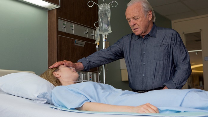 Anthony Hopkins with a patient in a hospital