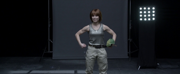 Noomi Rapace in a studio setting