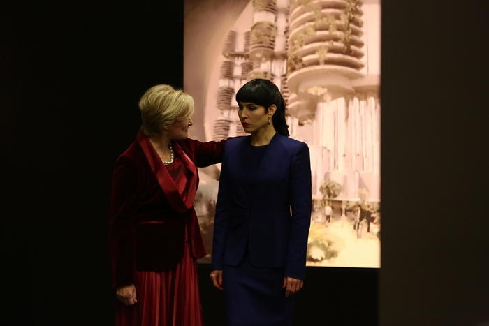 Noomi Rapace with an older woman