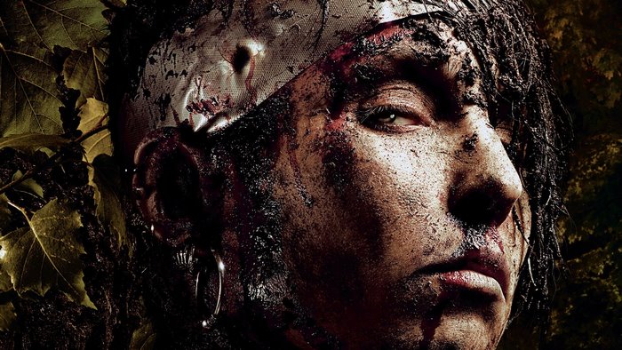 Noomi Rapace covered in dirt and blood