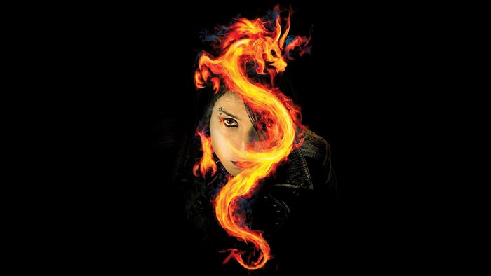 Woman with fiery dragon over her head
