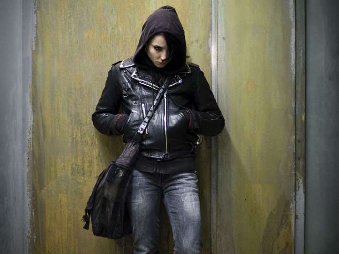 Noomi Rapace in a leather jacket