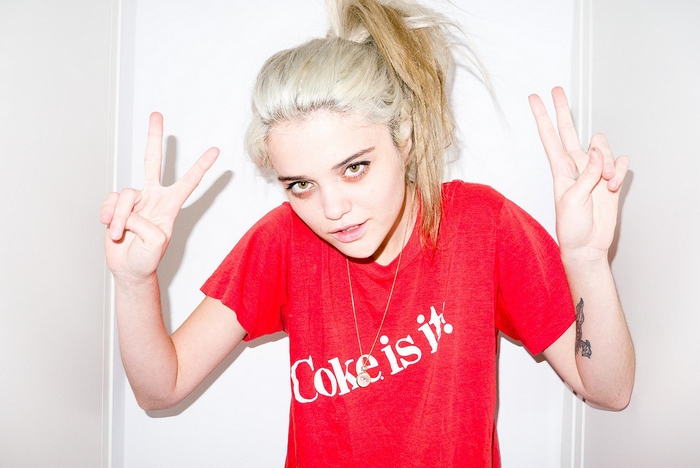 Sky Ferreira wearing a red Coke t-shirt