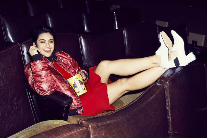 Camila Mendes in a movie theater