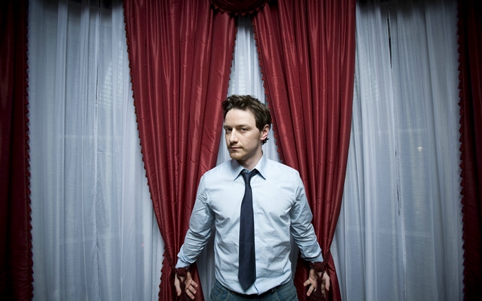 James McAvoy tied up in front of curtains