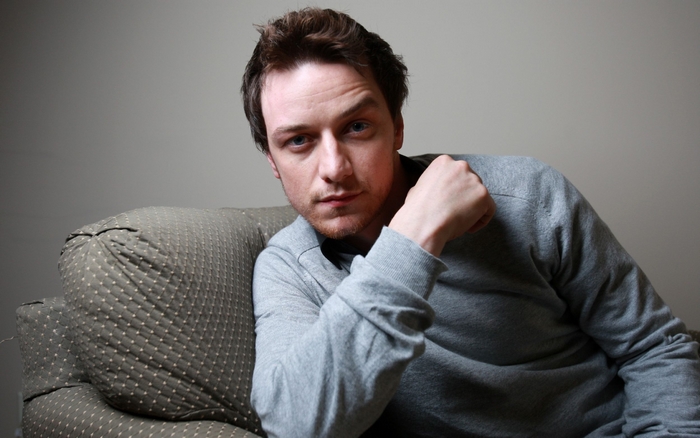 James McAvoy sitting on a couch