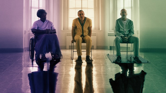 James McAvoy and two other men in a room