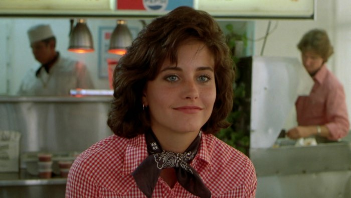 Courteney Cox in a diner
