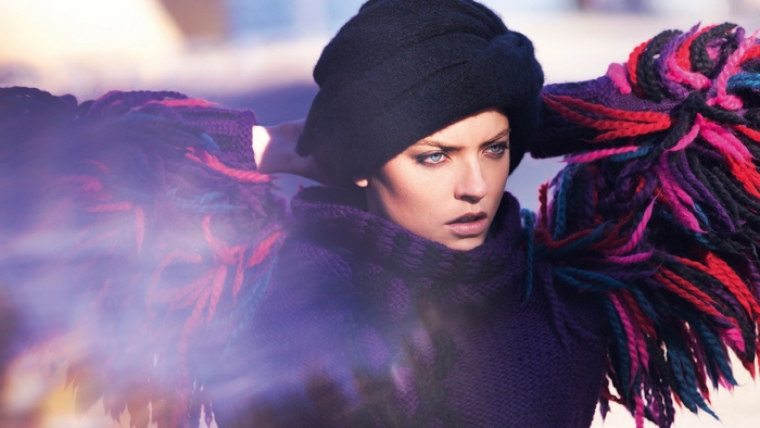 Martha Hunt in a black turban and colorful scarf