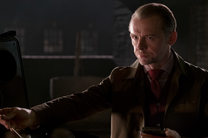 Simon Pegg in a dark room
