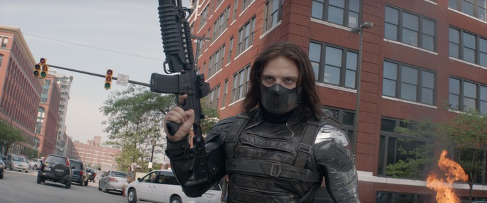 Bucky Barnes from Captain America holding a rifle