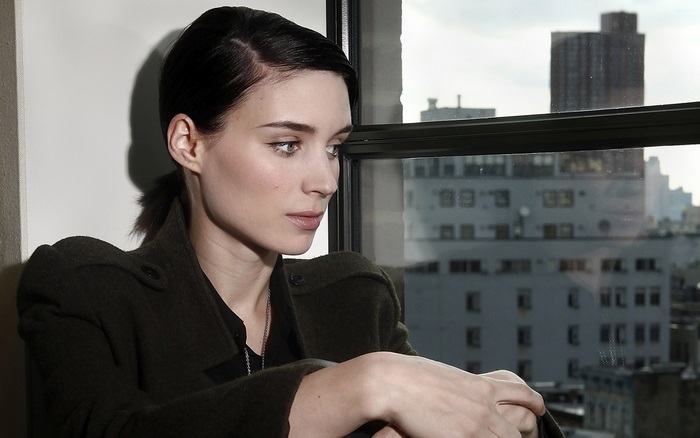 Rooney Mara posing by a window