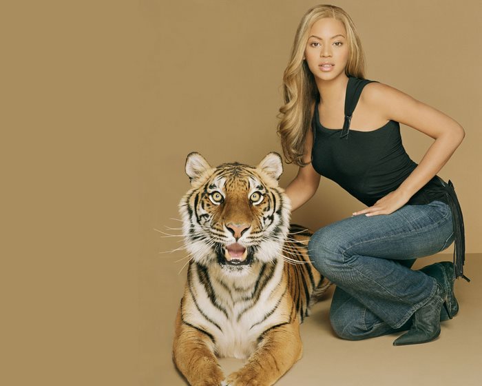 Beyoncé Knowles with a tiger