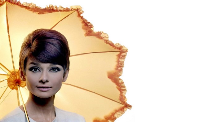 Audrey Hepburn with a parasol