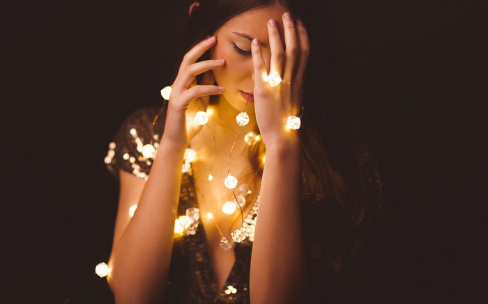 Woman with fairy lights