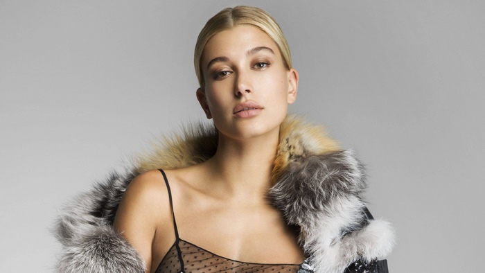 Hailey Baldwin in a fur-trimmed coat