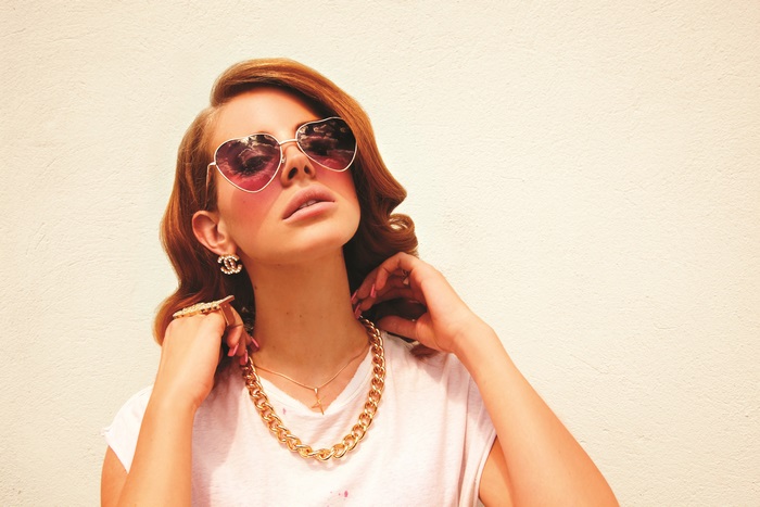Lana Del Rey wearing heart-shaped sunglasses