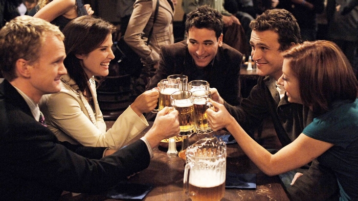 Ted Mosby from How I Met Your Mother toasting with friends