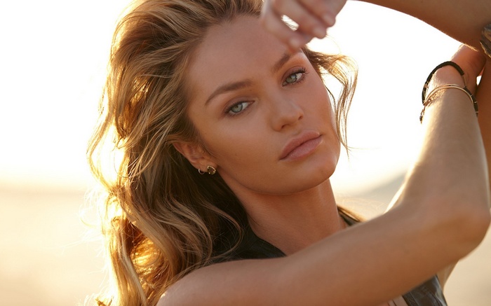 Candice Swanepoel posing outdoors