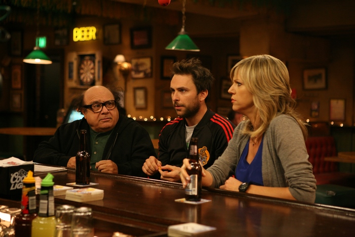 Charlie Day and two others at a bar