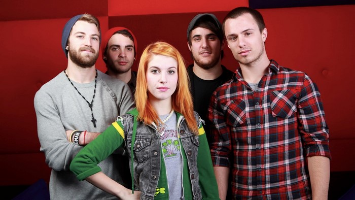 Paramore band members posing