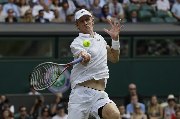 Kevin Anderson playing tennis at Wimbledon