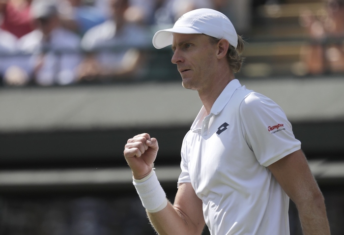 Kevin Anderson playing tennis