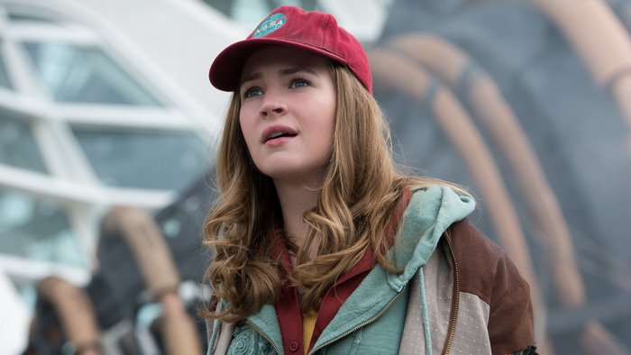 Britt Robertson wearing a red cap