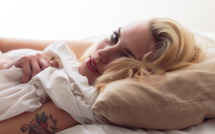 Woman lying on a pillow