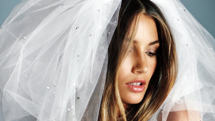 Lily Aldridge wearing a bridal veil