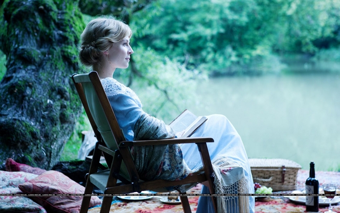 Clémence Poésy reading by a lake