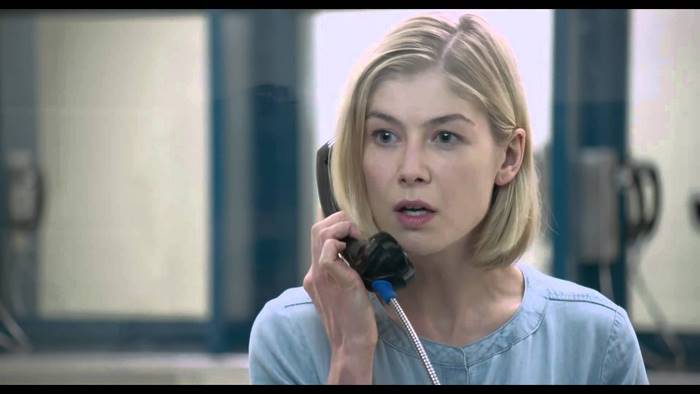 Rosamund Pike on a phone